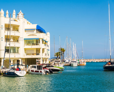 BENALMADENA, SPAIN - MAY 10, 2018 A beautiful marina with luxury yachts and motor boats in the tourist seaside town of Benalmadenaのeditorial素材