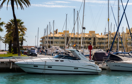 BENALMADENA, SPAIN - MAY 10, 2018 A beautiful marina with luxury yachts and motor boats in the tourist seaside town of Benalmadenaのeditorial素材