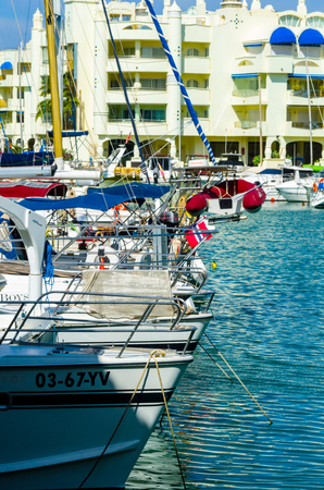 BENALMADENA, SPAIN - MAY 10, 2018 A beautiful marina with luxury yachts and motor boats in the tourist seaside town of Benalmadenaのeditorial素材