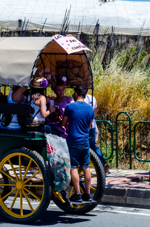NERJA, SPAIN - 15 MAY, 2018 people participating in the Catholic ceremony of transferring the holy figure in Spainのeditorial素材