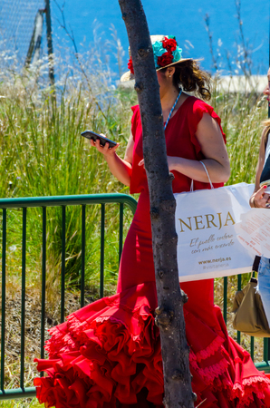 NERJA, SPAIN - 15 MAY, 2018 people participating in the Catholic ceremony of transferring the holy figure in Spainのeditorial素材
