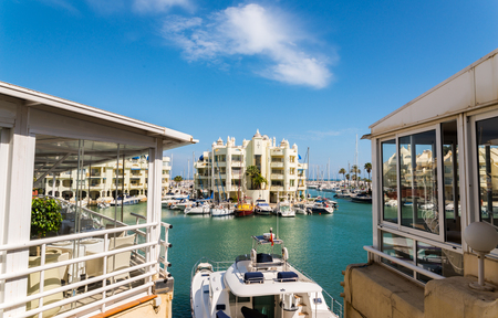 BENALMADENA, SPAIN - MAY 10, 2018 A beautiful marina with luxury yachts and motor boats in the tourist seaside town of Benalmadenaのeditorial素材