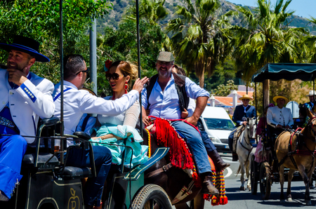 NERJA, SPAIN - 15 MAY, 2018 people participating in the Catholic ceremony of transferring the holy figure in Spainのeditorial素材