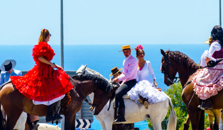 NERJA, SPAIN - 15 MAY, 2018 people participating in the Catholic ceremony of transferring the holy...