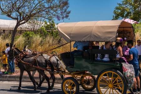 NERJA, SPAIN - 15 MAY, 2018 people participating in the Catholic ceremony of transferring the holy figure in Spainのeditorial素材