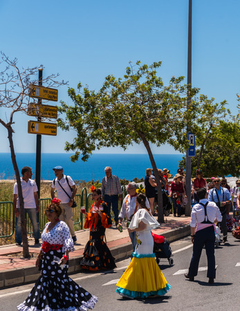 NERJA, SPAIN - 15 MAY, 2018 people participating in the Catholic ceremony of transferring the holy figure in Spainのeditorial素材