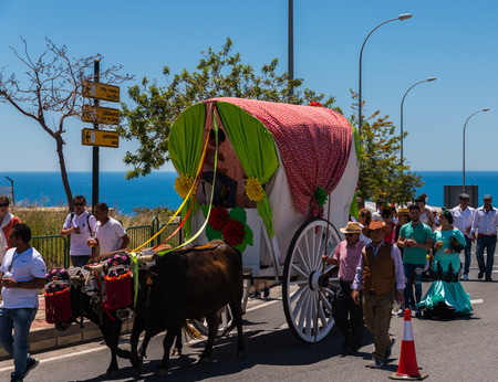 NERJA, SPAIN - 15 MAY, 2018 people participating in the Catholic ceremony of transferring the holy figure in Spainのeditorial素材