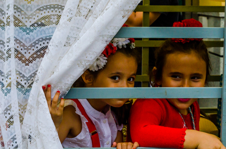 VELEZ MALAGA, SPAIN - MAY 19, 2018 people participating in the celebration of the Catholic ceremony of transferring the holy figure in Spainのeditorial素材