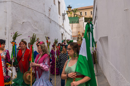 VELEZ MALAGA, SPAIN - MAY 19, 2018 people participating in the celebration of the Catholic ceremony...