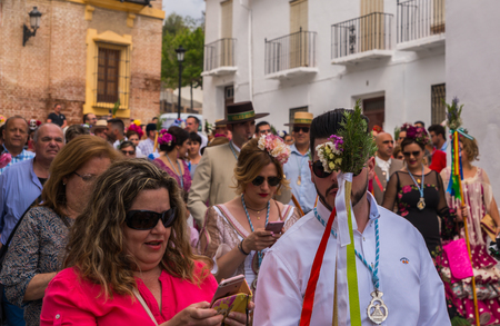 VELEZ MALAGA, SPAIN - MAY 19, 2018 people participating in the celebration of the Catholic ceremony of transferring the holy figure in Spainのeditorial素材