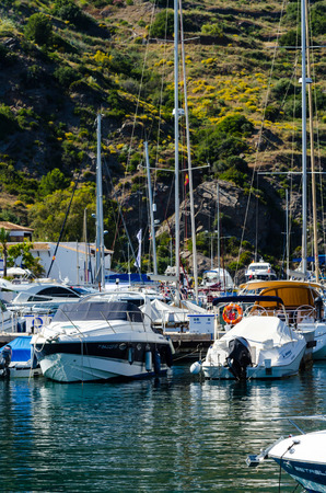 LA HERRADURA, SPAIN - MAY 26, 2018 A beautiful marina with luxury yachts and motor boats in the tourist seaside town of La Herraduraのeditorial素材