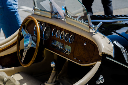 TORRE DEL MAR, SPAIN - JUNE 3, 2018 Old antique cars issued for tourists visiting a seaside town in Spainのeditorial素材