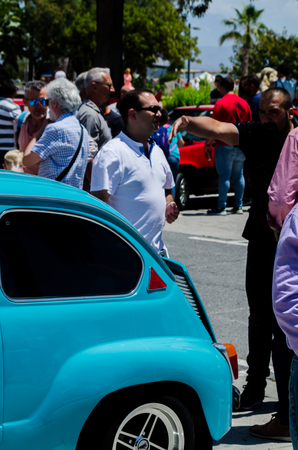 TORRE DEL MAR, SPAIN - JUNE 3, 2018 Old antique cars issued for tourists visiting a seaside town in Spainのeditorial素材