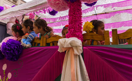 VELEZ MALAGA, SPAIN - MAY 19, 2018 people participating in the celebration of the Catholic ceremony of transferring the holy figure in Spainのeditorial素材
