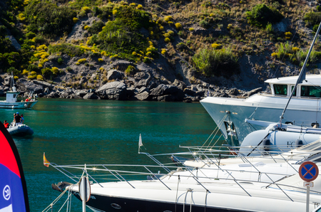 LA HERRADURA, SPAIN - MAY 26, 2018 A beautiful marina with luxury yachts and motor boats in the tourist seaside town of La Herraduraのeditorial素材