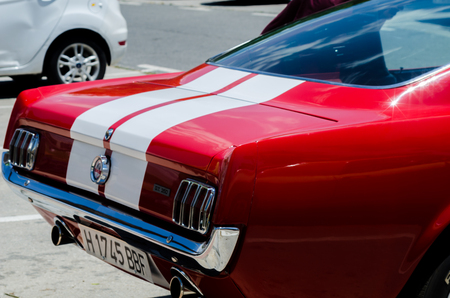 TORRE DEL MAR, SPAIN - JUNE 3, 2018 Old antique cars issued for tourists visiting a seaside town in Spainのeditorial素材