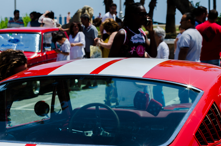 TORRE DEL MAR, SPAIN - JUNE 3, 2018 Old antique cars issued for tourists visiting a seaside town in Spainのeditorial素材