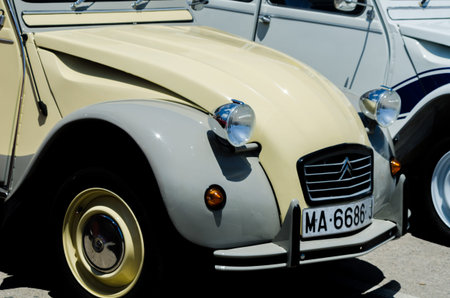 TORRE DEL MAR, SPAIN - JUNE 3, 2018 Old antique cars issued for tourists visiting a seaside town in...