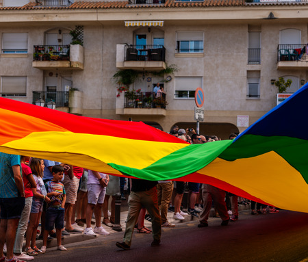 TORREMOLINOS, SPAIN - JUNE 2, 2018 LGBT march promoting equality and tolerance in a coastal town in Andaluciaのeditorial素材