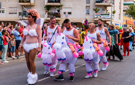 TORREMOLINOS, SPAIN - JUNE 2, 2018 LGBT march promoting equality and tolerance in a coastal town in Andaluciaのeditorial素材