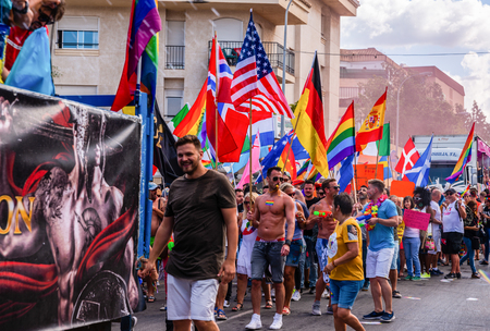 TORREMOLINOS, SPAIN - JUNE 2, 2018 LGBT march promoting equality and tolerance in a coastal town in Andaluciaのeditorial素材