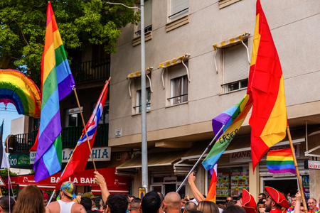 TORREMOLINOS, SPAIN - JUNE 2, 2018 LGBT march promoting equality and tolerance in a coastal town in Andaluciaのeditorial素材