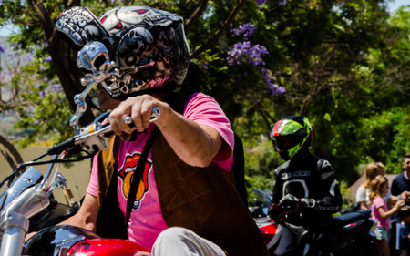 NERJA, SPAIN - JUNE 10, 2018 People and bikes on the motorcycle rally in a seaside Spanish town