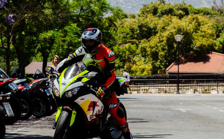 NERJA, SPAIN - JUNE 10, 2018 People and bikes on the motorcycle rally in a seaside Spanish town