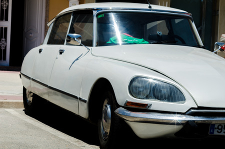 TORRE DEL MAR, SPAIN - JUNE 3, 2018 Old antique cars issued for tourists visiting a seaside town in Spainのeditorial素材