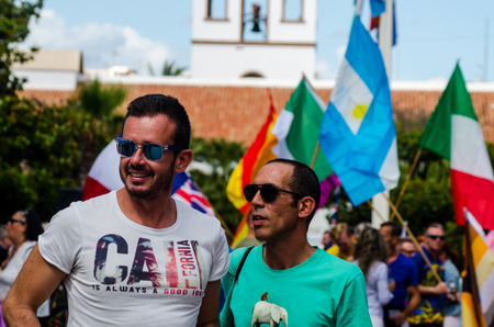 TORREMOLINOS, SPAIN - JUNE 2, 2018 LGBT march promoting equality and tolerance in a coastal town in Andaluciaのeditorial素材