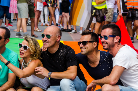 TORREMOLINOS, SPAIN - JUNE 2, 2018 LGBT march promoting equality and tolerance in a coastal town in Andaluciaのeditorial素材
