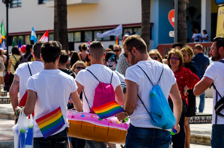 TORREMOLINOS, SPAIN - JUNE 2, 2018 LGBT march promoting equality and tolerance in a coastal town in Andaluciaのeditorial素材
