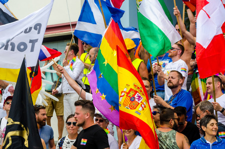 TORREMOLINOS, SPAIN - JUNE 2, 2018 LGBT march promoting equality and tolerance in a coastal town in Andaluciaのeditorial素材