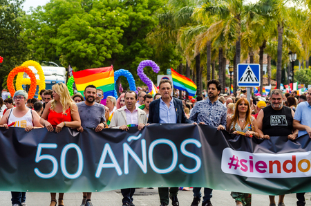 TORREMOLINOS, SPAIN - JUNE 2, 2018 LGBT march promoting equality and tolerance in a coastal town in Andaluciaのeditorial素材