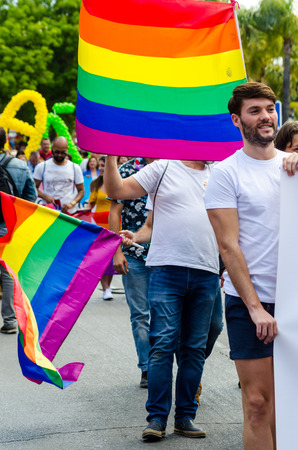 TORREMOLINOS, SPAIN - JUNE 2, 2018 LGBT march promoting equality and tolerance in a coastal town in Andaluciaのeditorial素材