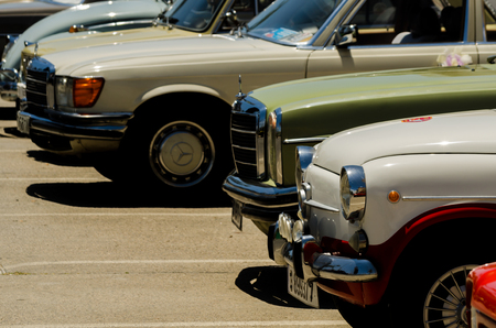 TORRE DEL MAR, SPAIN - JUNE 3, 2018 Old antique cars issued for tourists visiting a seaside town in Spainのeditorial素材