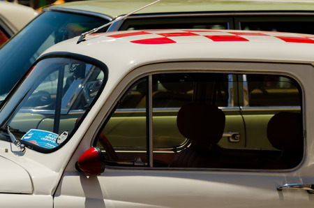 TORRE DEL MAR, SPAIN - JUNE 3, 2018 Old antique cars issued for tourists visiting a seaside town in Spainのeditorial素材