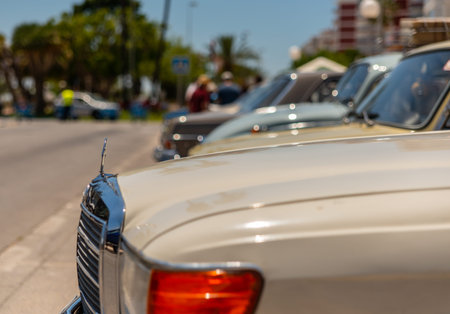 TORRE DEL MAR, SPAIN - JUNE 3, 2018 Old antique cars issued for tourists visiting a seaside town in...