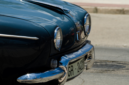 TORRE DEL MAR, SPAIN - JUNE 3, 2018 Old antique cars issued for tourists visiting a seaside town in Spainのeditorial素材