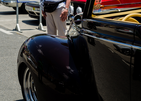 TORRE DEL MAR, SPAIN - JUNE 3, 2018 Old antique cars issued for tourists visiting a seaside town in Spainのeditorial素材