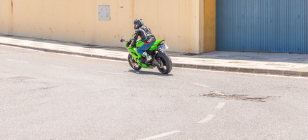 NERJA, SPAIN - JUNE 10, 2018 People and bikes on the motorcycle rally in a seaside Spanish townのeditorial素材
