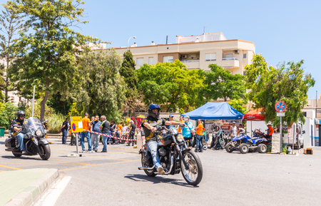 NERJA, SPAIN - JUNE 10, 2018 People and bikes on the motorcycle rally in a seaside Spanish townのeditorial素材