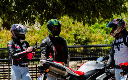 NERJA, SPAIN - JUNE 10, 2018 People and bikes on the motorcycle rally in a seaside Spanish town