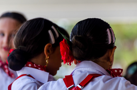 TORRE DEL MAR, SPAIN - JULY 22, 2018 show of Latin dance performed by a dance group in the rhythm of Spanish music, children in folk costumes performing in front of the audience, dance showのeditorial素材