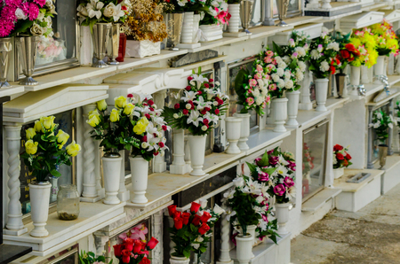 COMARES, SPAIN - 28 JUNE 2018 characteristic of the Spanish burial site in the walls, typical graves in the region of Andalusia, Christianityのeditorial素材