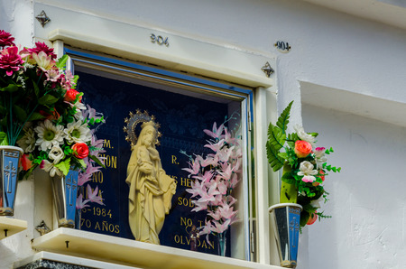 COMARES, SPAIN - 28 JUNE 2018 characteristic of the Spanish burial site in the walls, typical graves in the region of Andalusia, Christianityのeditorial素材
