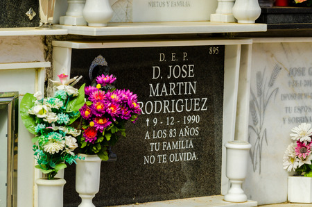 COMARES, SPAIN - 28 JUNE 2018 characteristic of the Spanish burial site in the walls, typical graves in the region of Andalusia, Christianityのeditorial素材