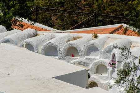 SAYALONGA, SPAIN - 06 MAY 2018 characteristic of the Spanish burial site in the walls, typical graves in the region of Andalusia, Christianityのeditorial素材