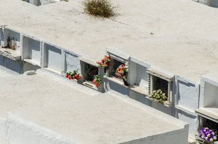 SAYALONGA, SPAIN - 06 MAY 2018 characteristic of the Spanish burial site in the walls, typical graves in the region of Andalusia, Christianityのeditorial素材