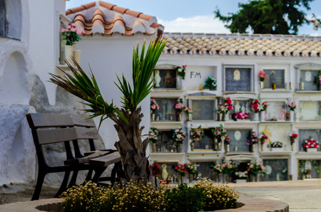 COMARES, SPAIN - 28 JUNE 2018 characteristic of the Spanish burial site in the walls, typical graves in the region of Andalusia, Christianityのeditorial素材